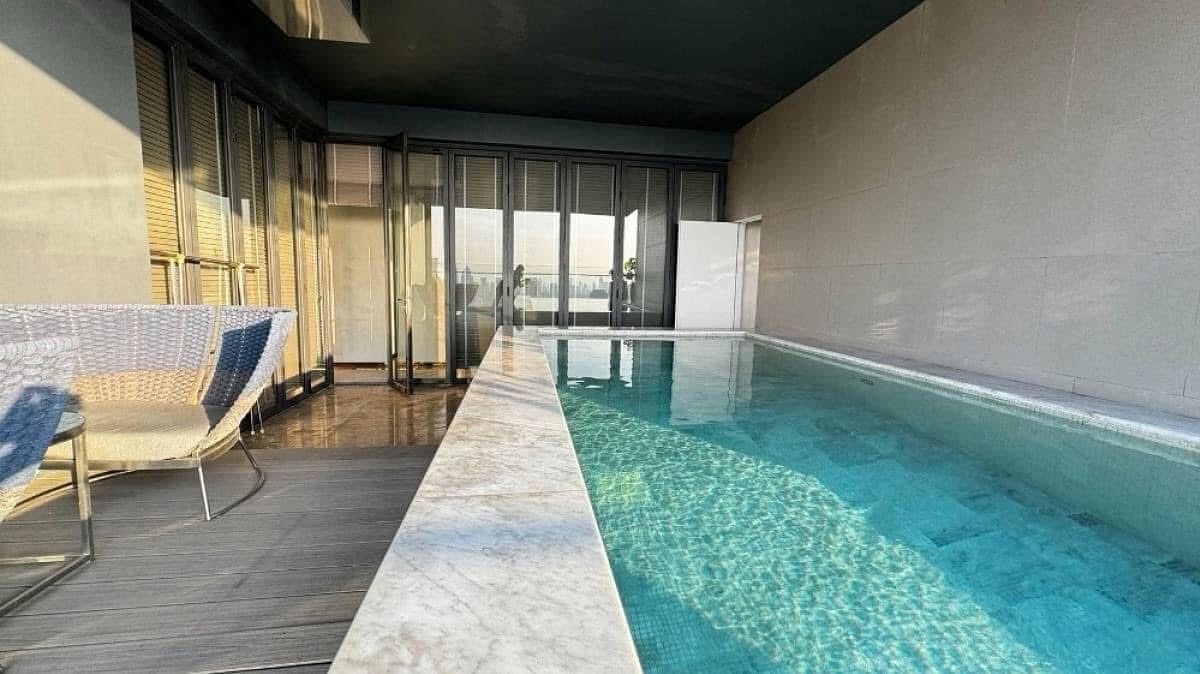 Rent this luxurious 3-bedroom, 4-bathroom penthouse at MARQUE Sukhumvit, 297 sqm, with private pool and elevator. Available for 700,000 THB/month. Prime location