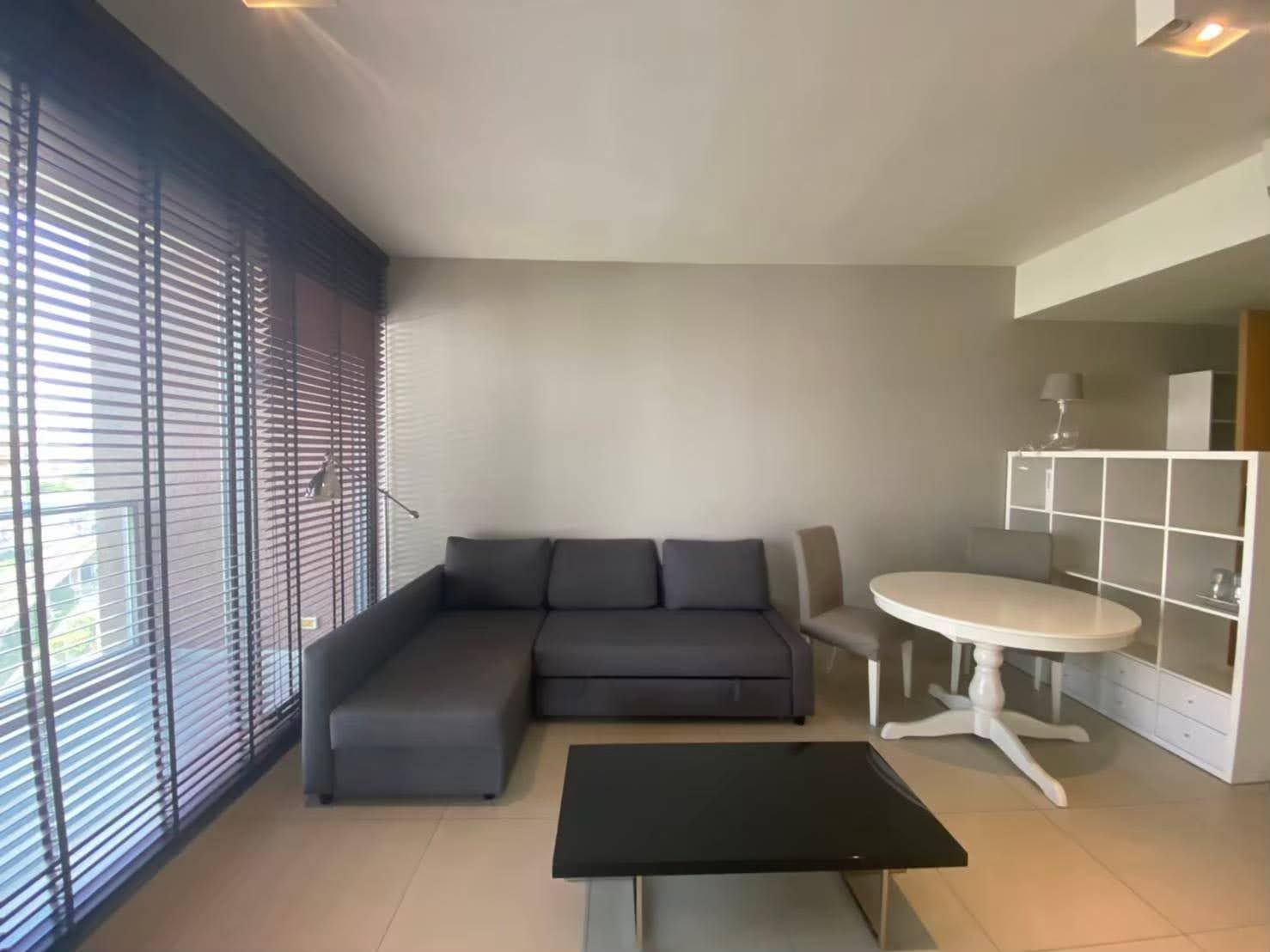 Beautiful 2-bed, 2-bath condo at The Lofts Ekkamai, 75 sqm. Rent for 60,000 THB/month. Fully furnished, modern design, and easy access to Ekkamai BTS.