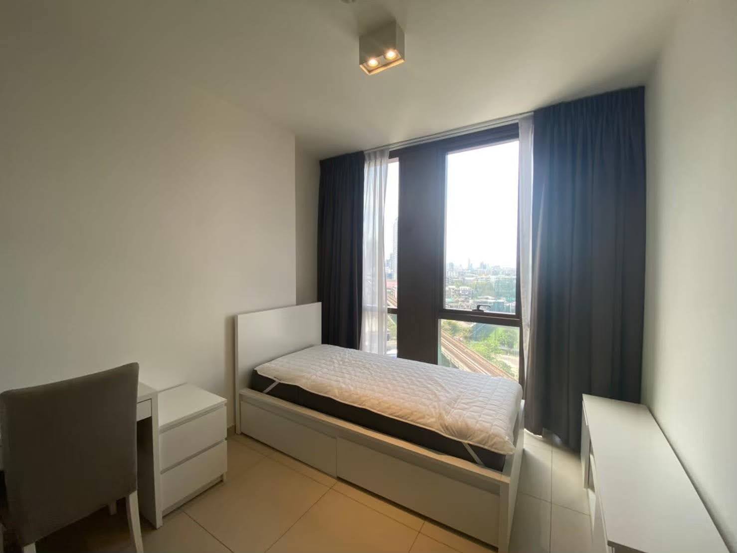 Beautiful 2-bed, 2-bath condo at The Lofts Ekkamai, 75 sqm. Rent for 60,000 THB/month. Fully furnished, modern design, and easy access to Ekkamai BTS.