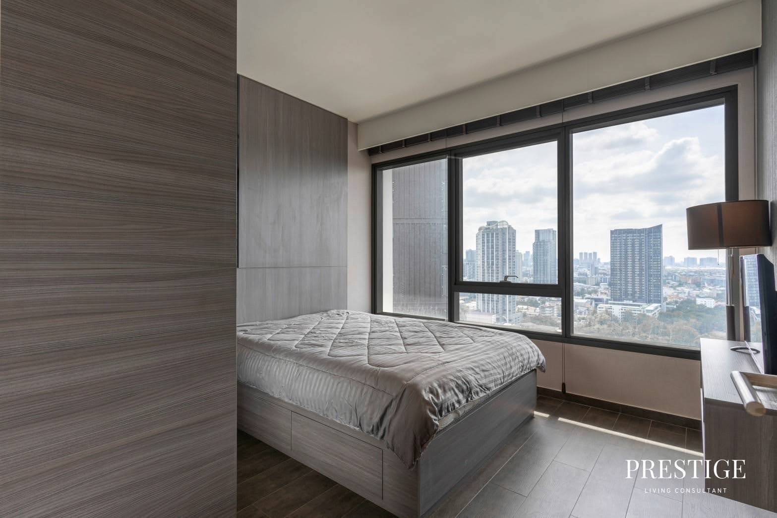 Stylish 2-bed, 2-bath condo at The Lofts Ekkamai, 90 sqm. Rent for 70,000 THB/month. Fully furnished with modern amenities, near Ekkamai BTS.
