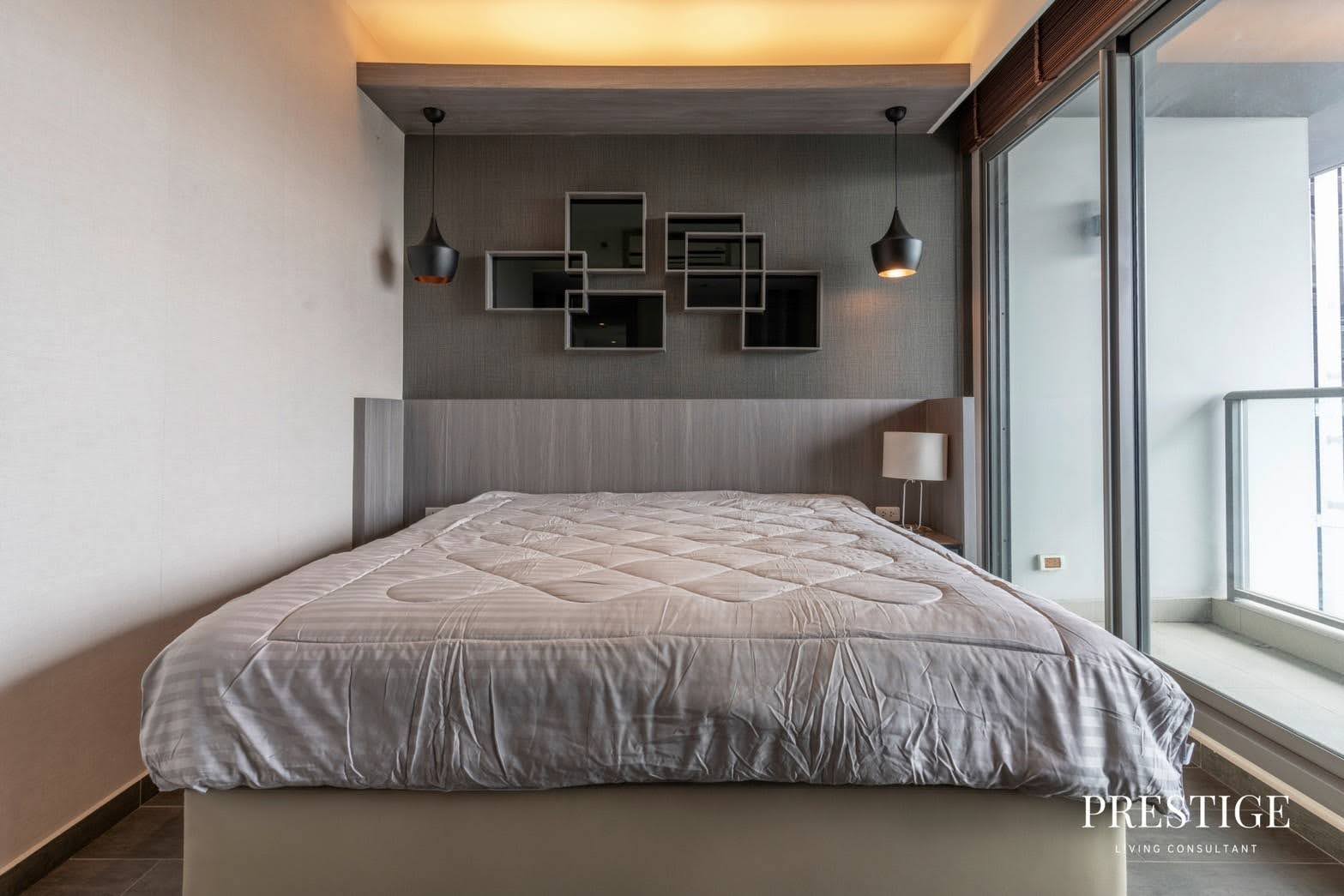 Stylish 2-bed, 2-bath condo at The Lofts Ekkamai, 90 sqm. Rent for 70,000 THB/month. Fully furnished with modern amenities, near Ekkamai BTS.