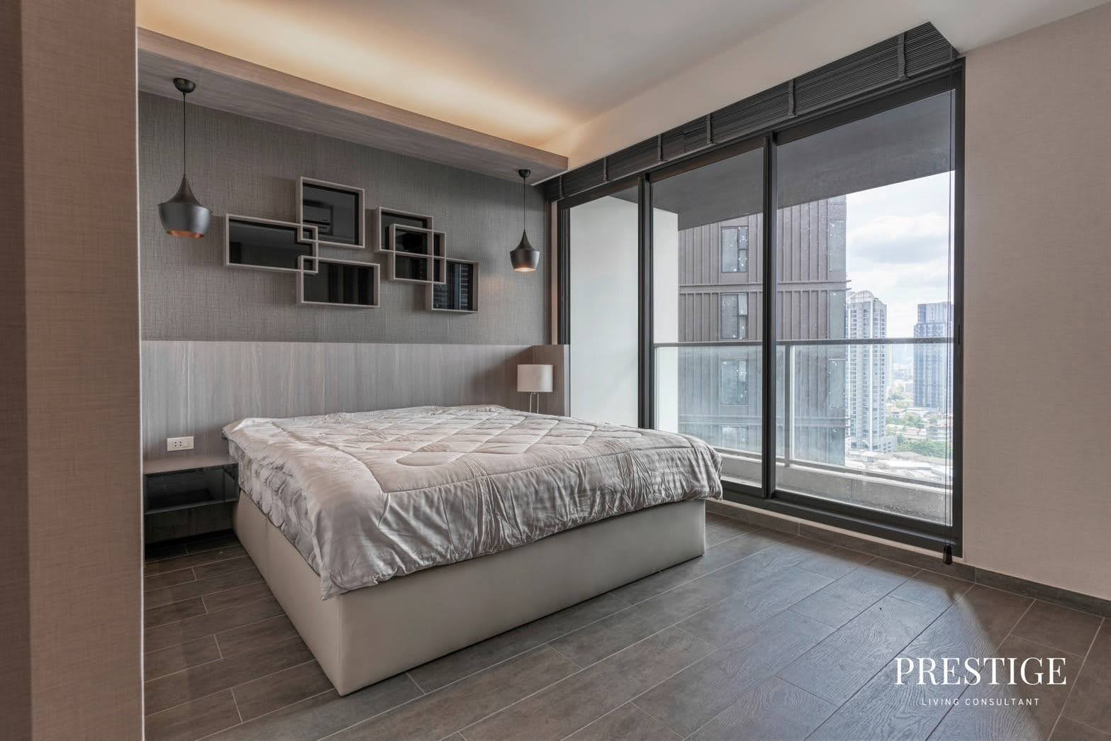 Stylish 2-bed, 2-bath condo at The Lofts Ekkamai, 90 sqm. Rent for 70,000 THB/month. Fully furnished with modern amenities, near Ekkamai BTS.
