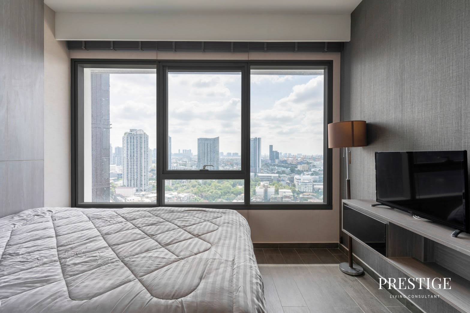 Stylish 2-bed, 2-bath condo at The Lofts Ekkamai, 90 sqm. Rent for 70,000 THB/month. Fully furnished with modern amenities, near Ekkamai BTS.