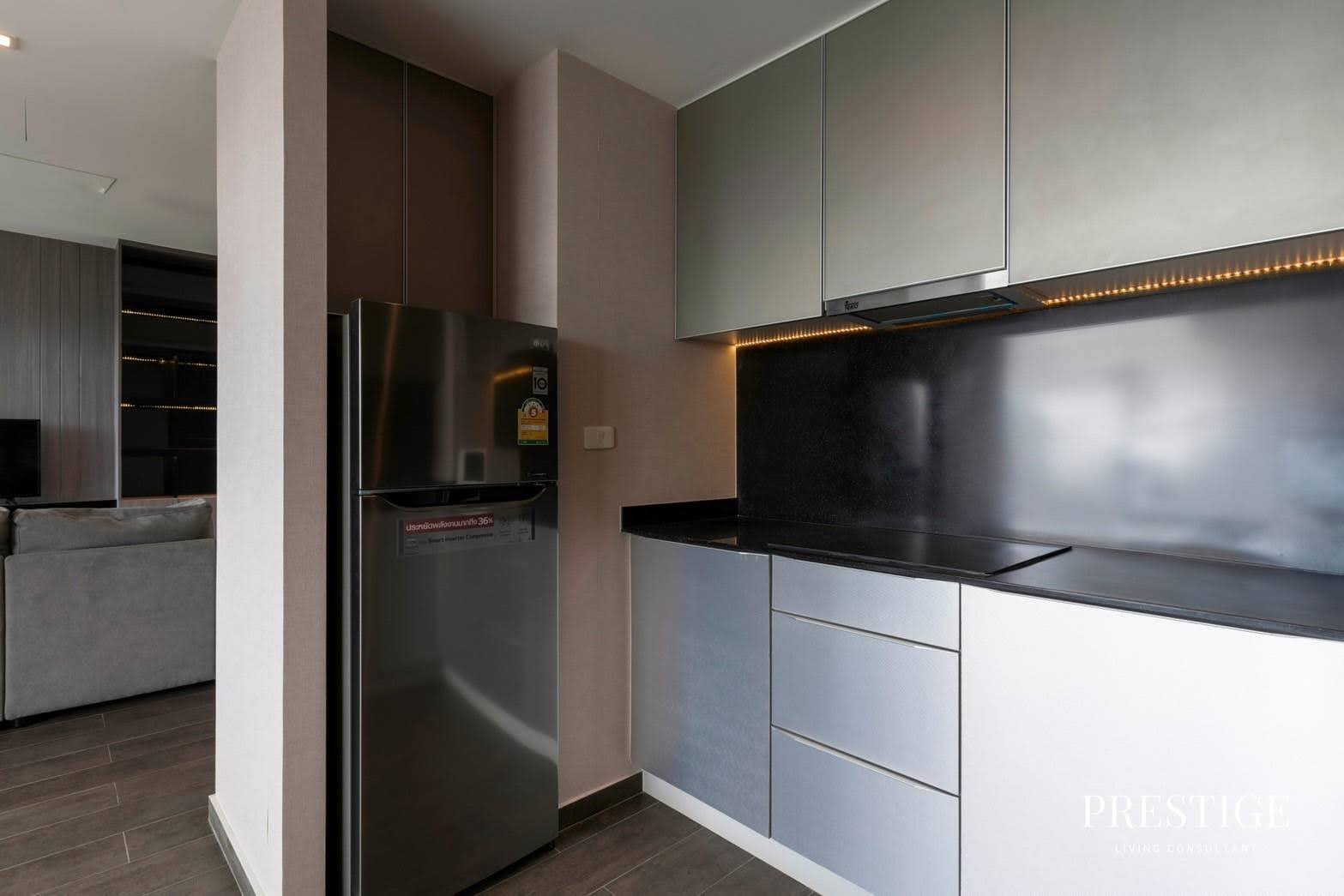 Stylish 2-bed, 2-bath condo at The Lofts Ekkamai, 90 sqm. Rent for 70,000 THB/month. Fully furnished with modern amenities, near Ekkamai BTS.
