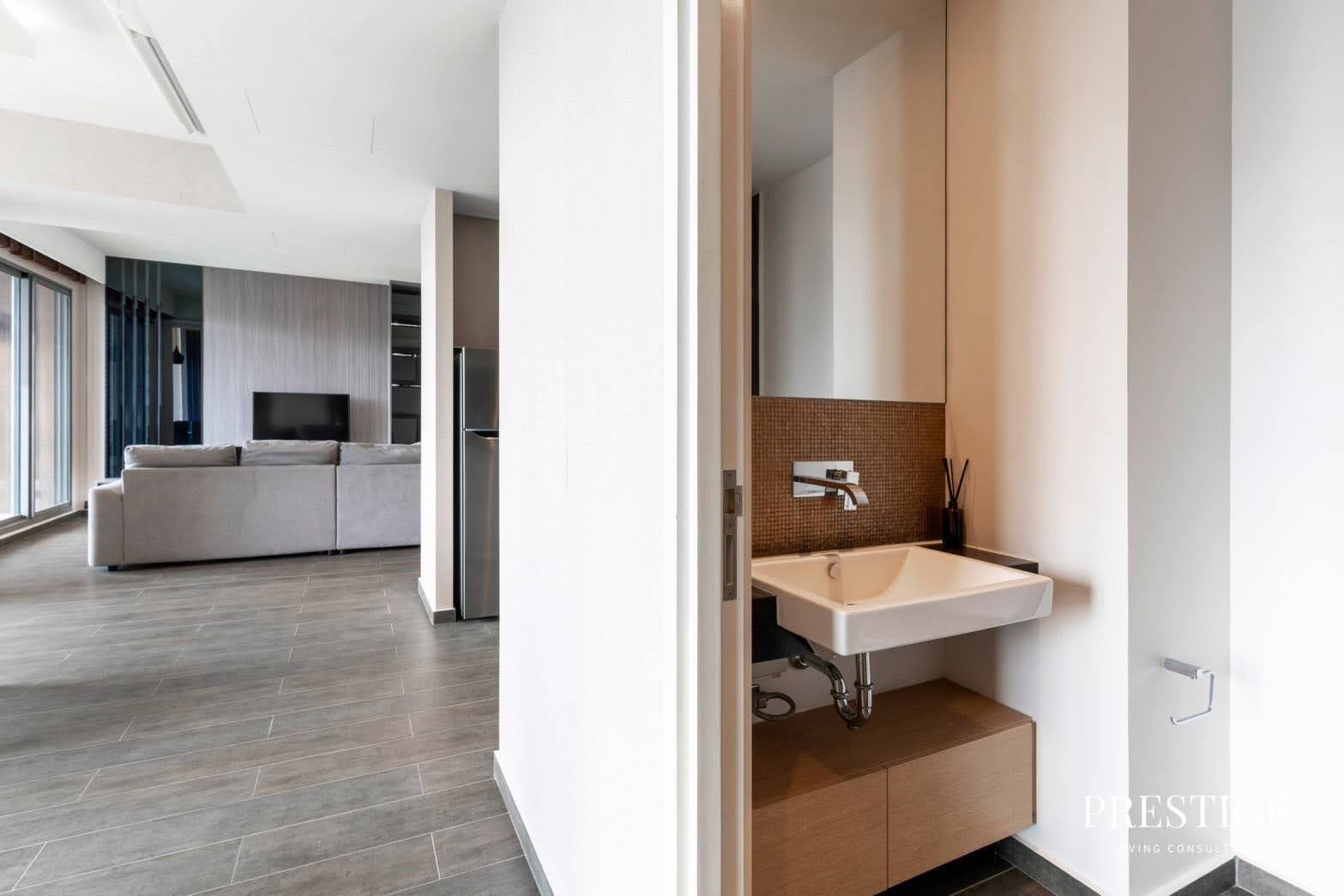 Stylish 2-bed, 2-bath condo at The Lofts Ekkamai, 90 sqm. Rent for 70,000 THB/month. Fully furnished with modern amenities, near Ekkamai BTS.