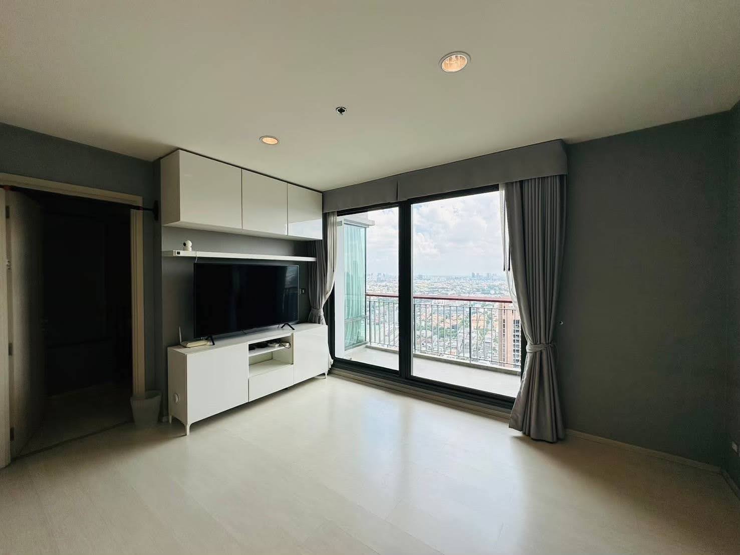 Modern 2-bed, 2-bath condo at Rhythm Sukhumvit 42, 79 sqm. Rent for 65,000 THB/month, fully furnished, near Ekkamai BTS. Great amenities and location!