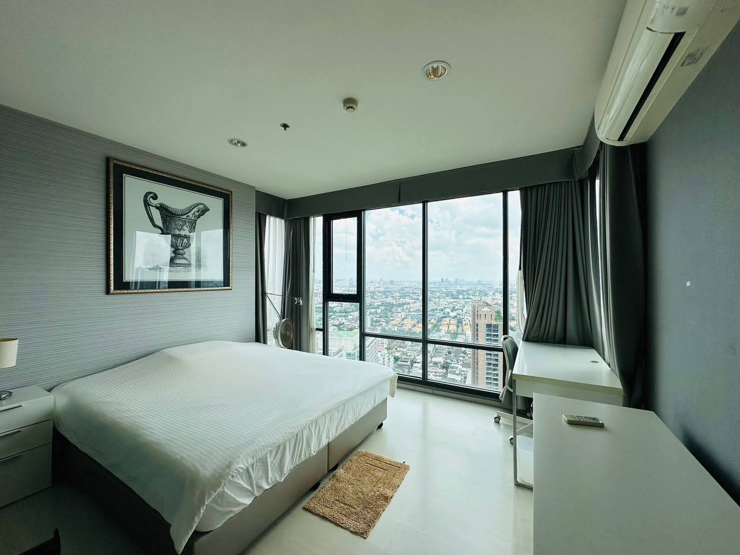 Modern 2-bed, 2-bath condo at Rhythm Sukhumvit 42, 79 sqm. Rent for 65,000 THB/month, fully furnished, near Ekkamai BTS. Great amenities and location!