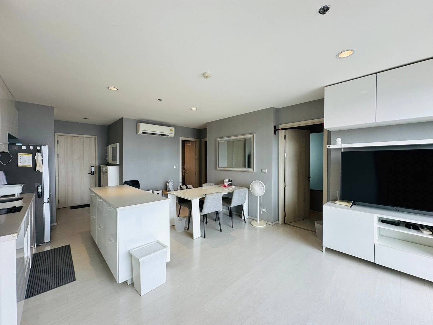 Modern 2-bed, 2-bath condo at Rhythm Sukhumvit 42, 79 sqm. Rent for 65,000 THB/month, fully furnished, near Ekkamai BTS. Great amenities and location!