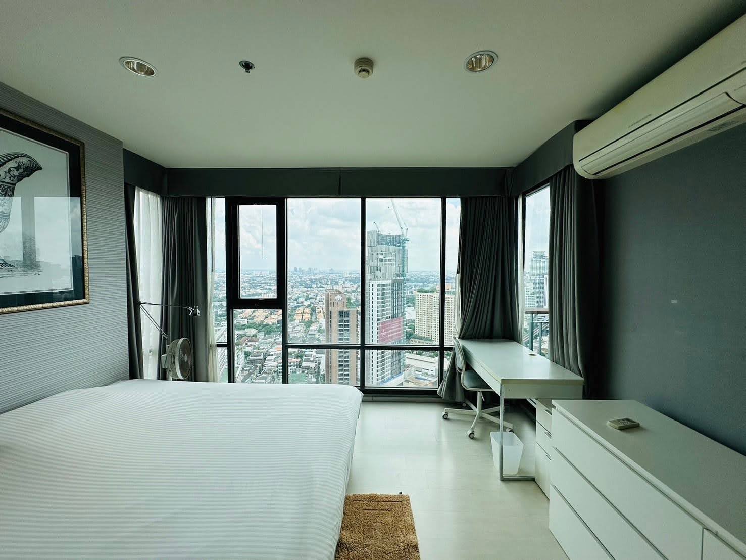 Modern 2-bed, 2-bath condo at Rhythm Sukhumvit 42, 79 sqm. Rent for 65,000 THB/month, fully furnished, near Ekkamai BTS. Great amenities and location!