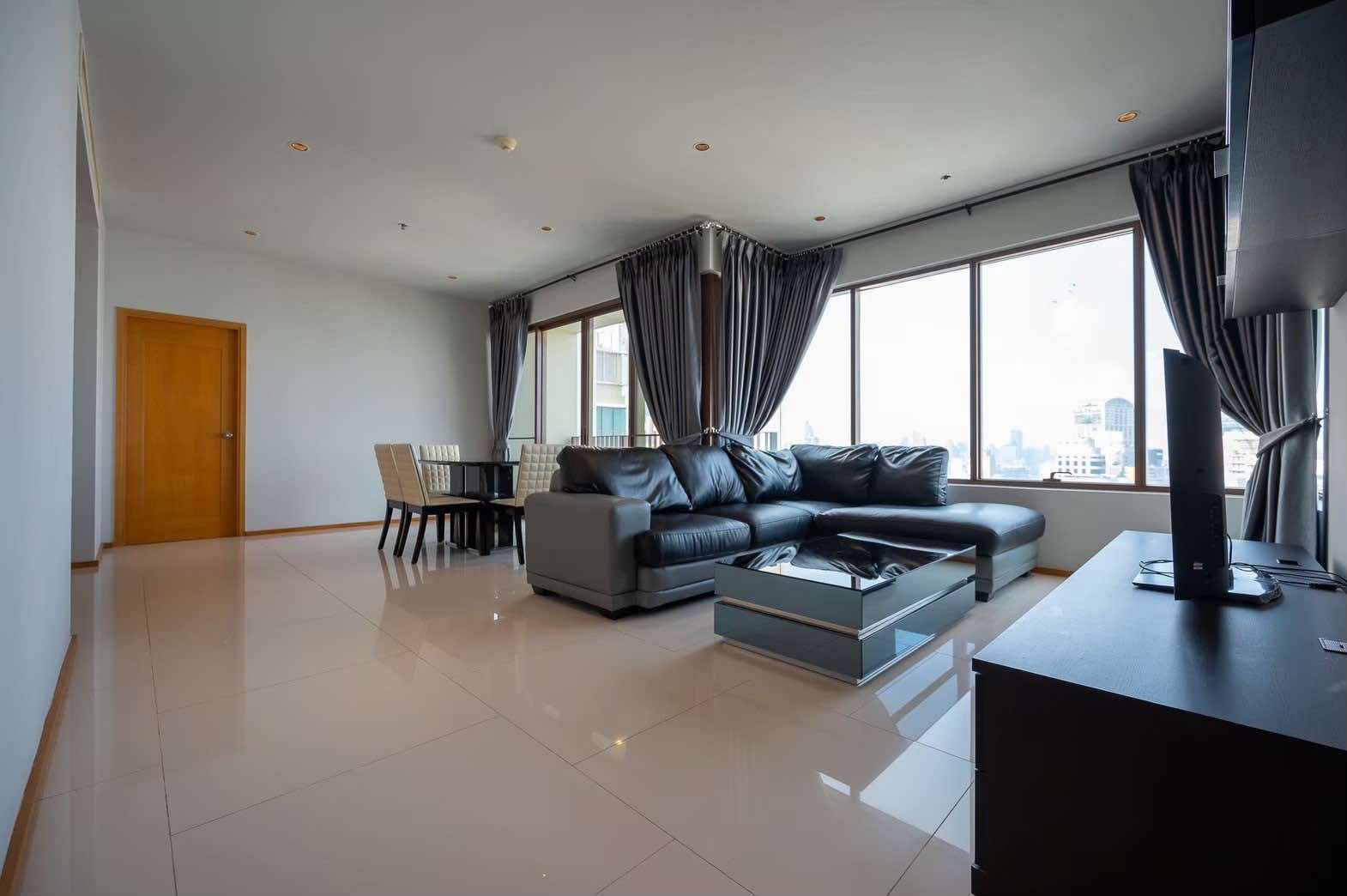 Spacious 2-bed, 2-bath condo at Emporio Place, 105 sqm, fully furnished. For rent at 55,000 THB/month. Great location near Phrom Phong BTS and malls.