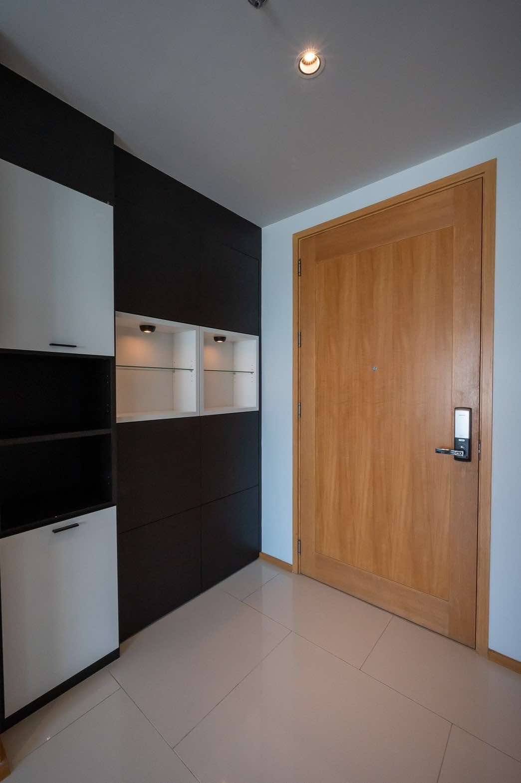 Spacious 2-bed, 2-bath condo at Emporio Place, 105 sqm, fully furnished. For rent at 55,000 THB/month. Great location near Phrom Phong BTS and malls.