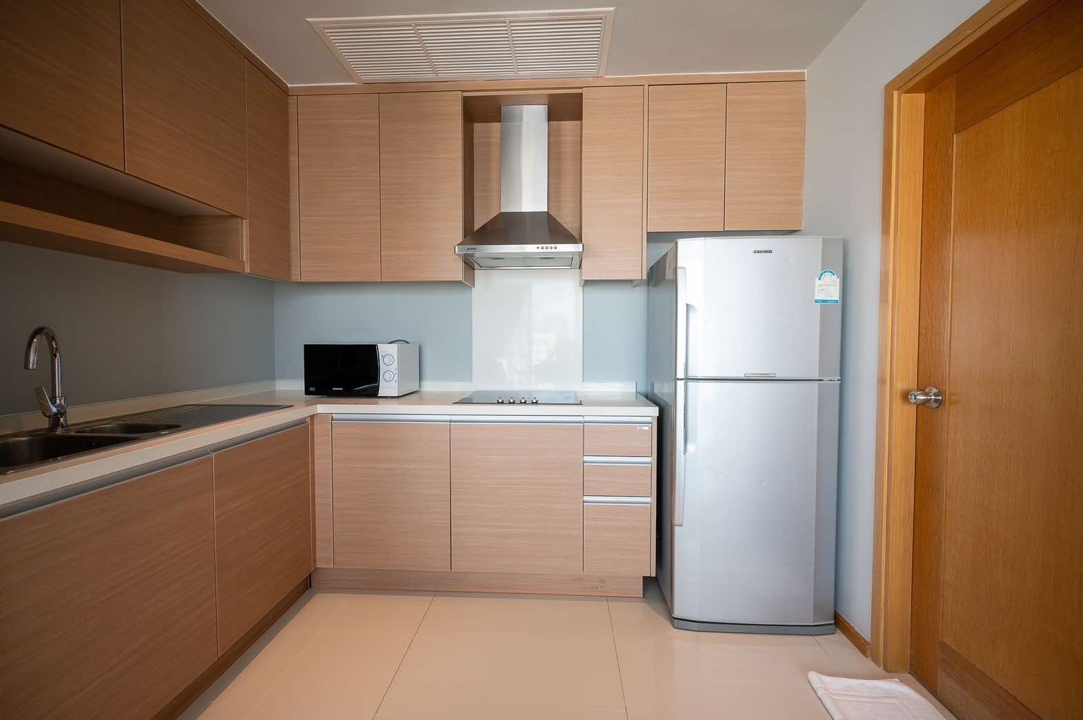 Spacious 2-bed, 2-bath condo at Emporio Place, 105 sqm, fully furnished. For rent at 55,000 THB/month. Great location near Phrom Phong BTS and malls.