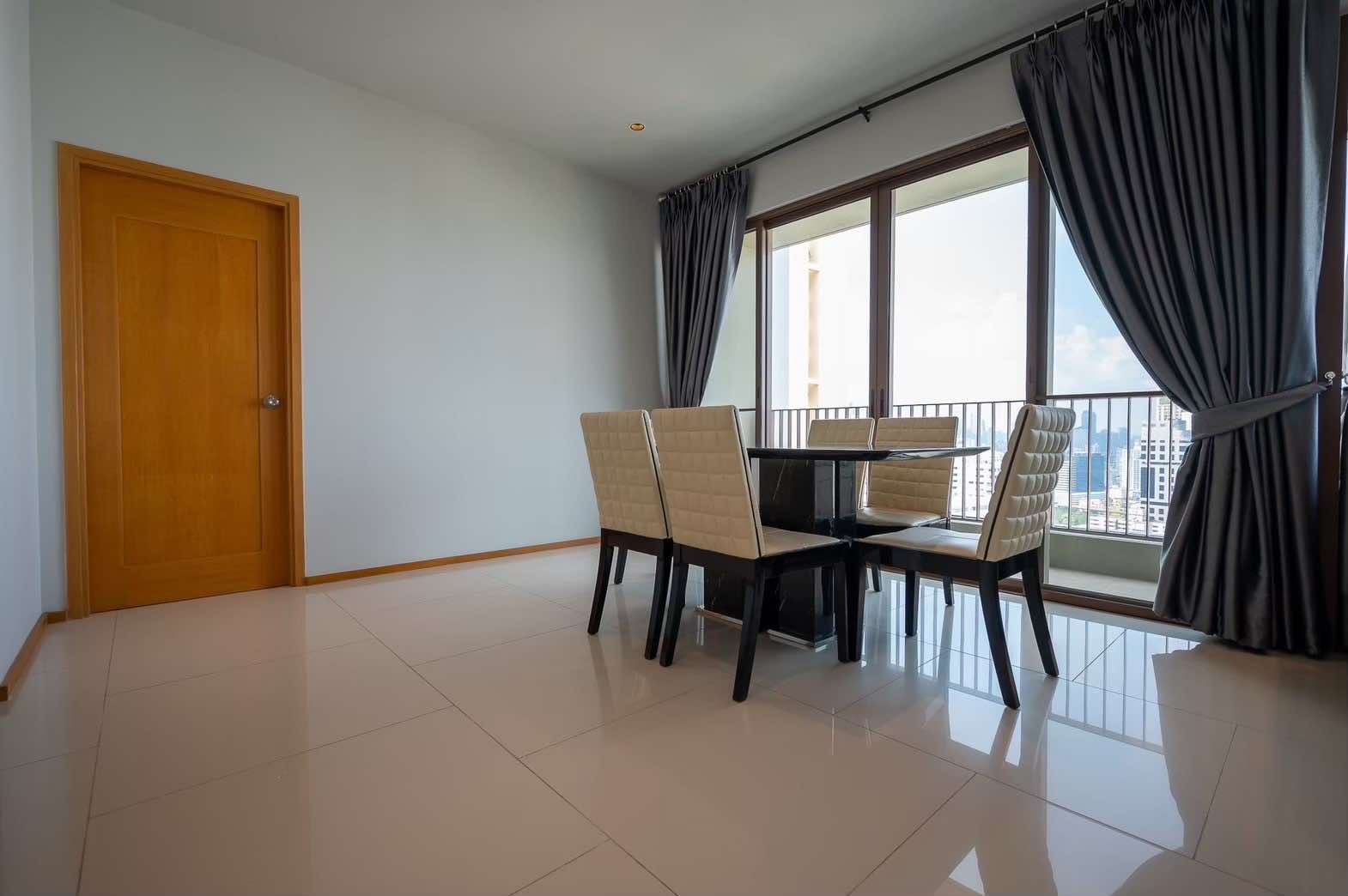 Spacious 2-bed, 2-bath condo at Emporio Place, 105 sqm, fully furnished. For rent at 55,000 THB/month. Great location near Phrom Phong BTS and malls.