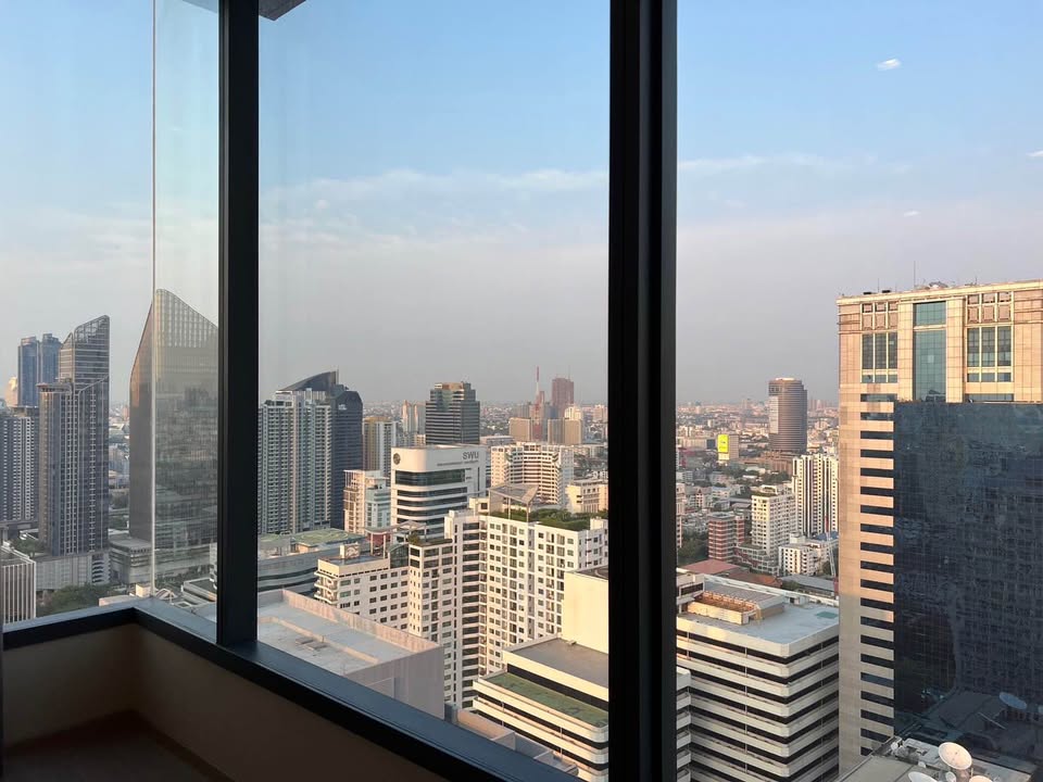 Discover luxury living at The Esse Asoke with this 2-bedroom, 2-bathroom corner condo for sale. High floor, 75.5 sqm, fully furnished. Sale for 20,000,000 THB