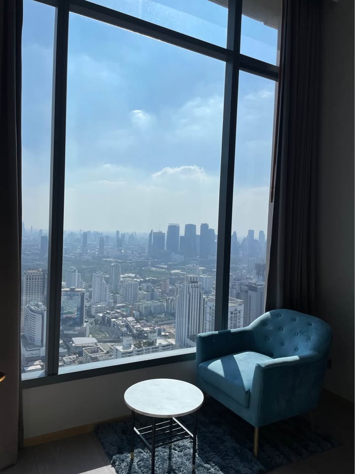 Own a luxurious 157 sqm penthouse at The Esse Asoke, Bangkok. Featuring 2 bedrooms, 3 bathrooms, breathtaking views, and premium amenities. Sale price: 60M THB.
