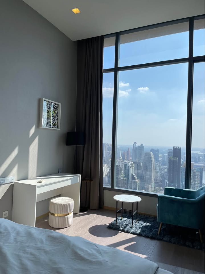 Own a luxurious 157 sqm penthouse at The Esse Asoke, Bangkok. Featuring 2 bedrooms, 3 bathrooms, breathtaking views, and premium amenities. Sale price: 60M THB.