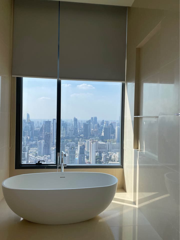Own a luxurious 157 sqm penthouse at The Esse Asoke, Bangkok. Featuring 2 bedrooms, 3 bathrooms, breathtaking views, and premium amenities. Sale price: 60M THB.
