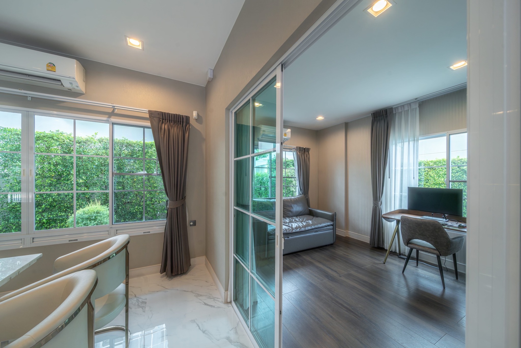 Stunning 4-bed, 4-bath house at Nantawan Ramintra. 291 sqm, pet-friendly, with private parking. Rent at 200,000 THB/month or sale at 30M.