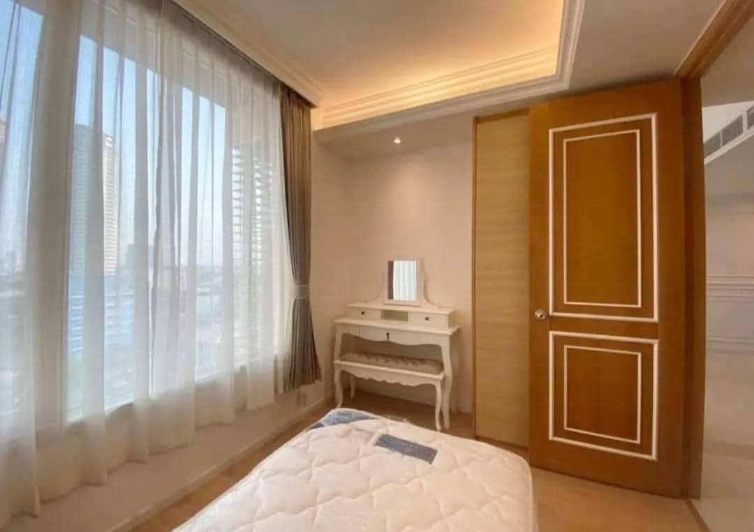 2-bed, 2-bath duplex at The Empire Place Sathorn, near BTS Chong Nonsi, 120 sqm, fully furnished, 60,000 THB/month, available from January 20, 2025.
