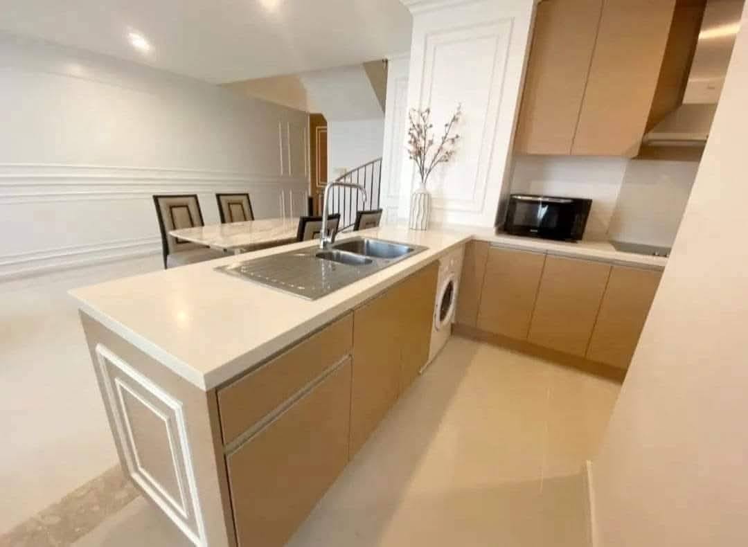 2-bed, 2-bath duplex at The Empire Place Sathorn, near BTS Chong Nonsi, 120 sqm, fully furnished, 60,000 THB/month, available from January 20, 2025.