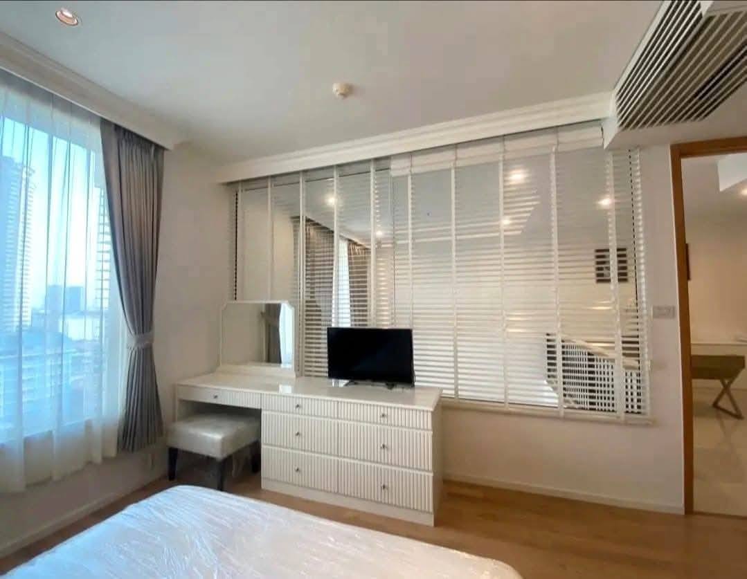 2-bed, 2-bath duplex at The Empire Place Sathorn, near BTS Chong Nonsi, 120 sqm, fully furnished, 60,000 THB/month, available from January 20, 2025.