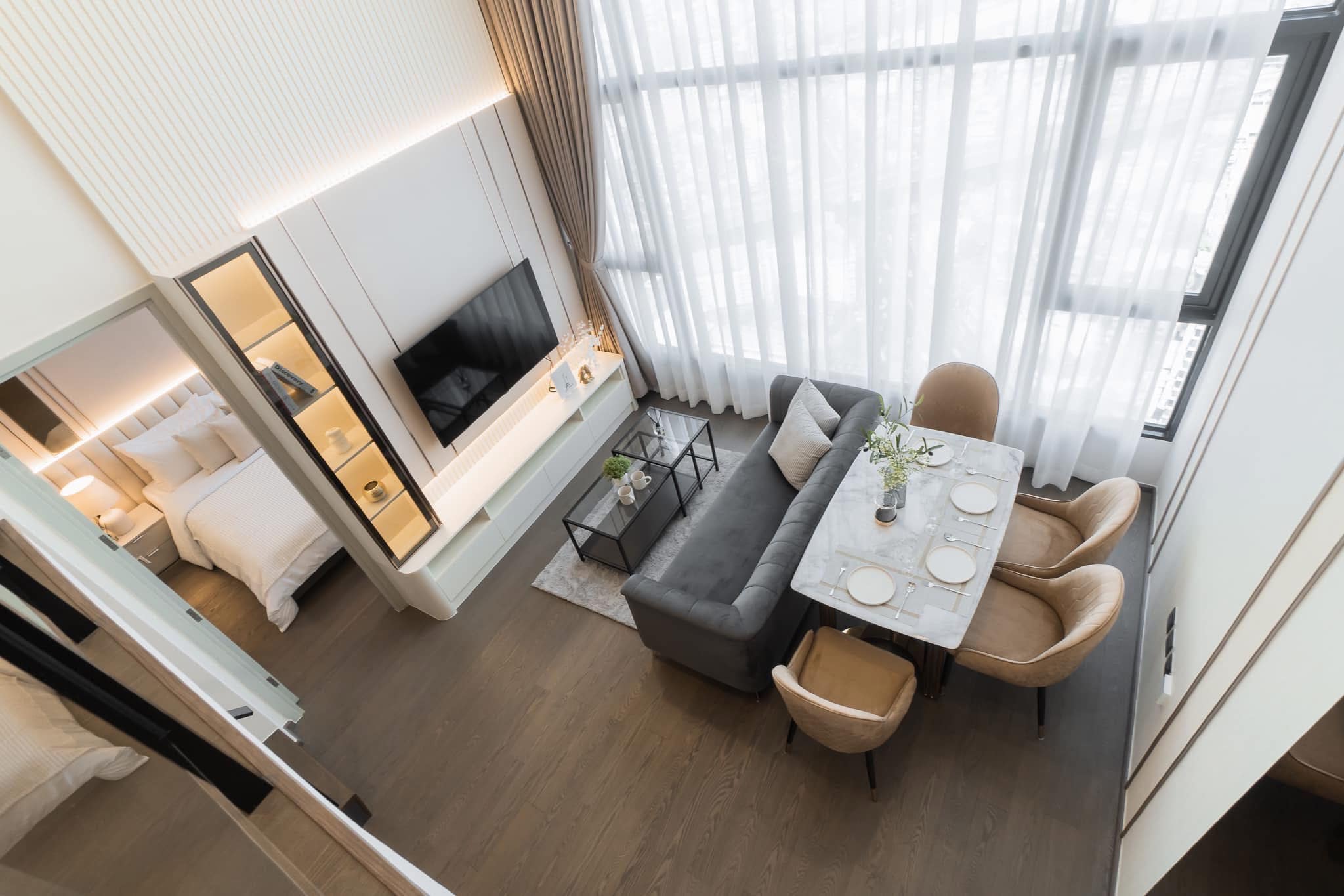 Luxury 2-bed, 2-bath duplex at Park Origin Chula-Samyan. 64 sqm, Chao Phraya River view, MRT Sam Yan nearby. For rent 65K THB/month..