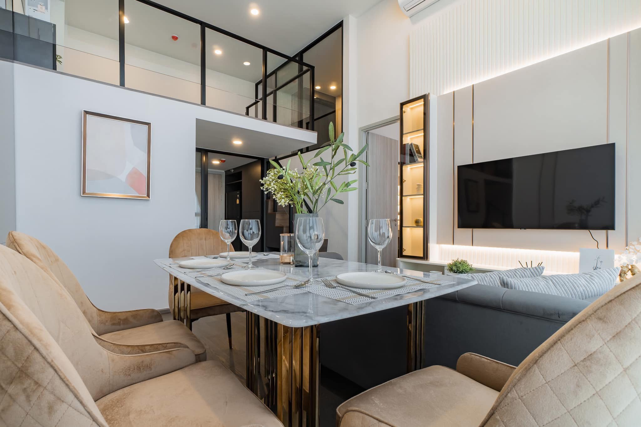 Luxury 2-bed, 2-bath duplex at Park Origin Chula-Samyan. 64 sqm, Chao Phraya River view, MRT Sam Yan nearby. For rent 65K THB/month..