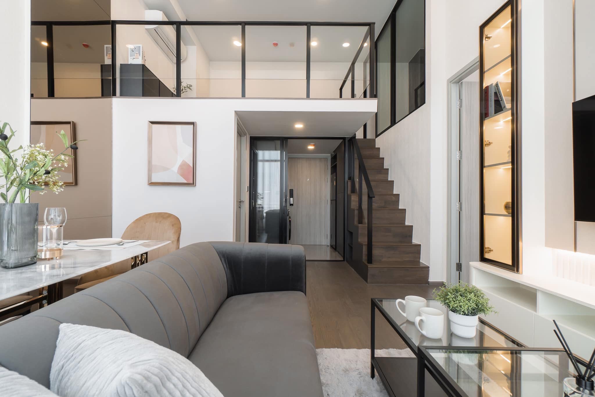 Luxury 2-bed, 2-bath duplex at Park Origin Chula-Samyan. 64 sqm, Chao Phraya River view, MRT Sam Yan nearby. For rent 65K THB/month..