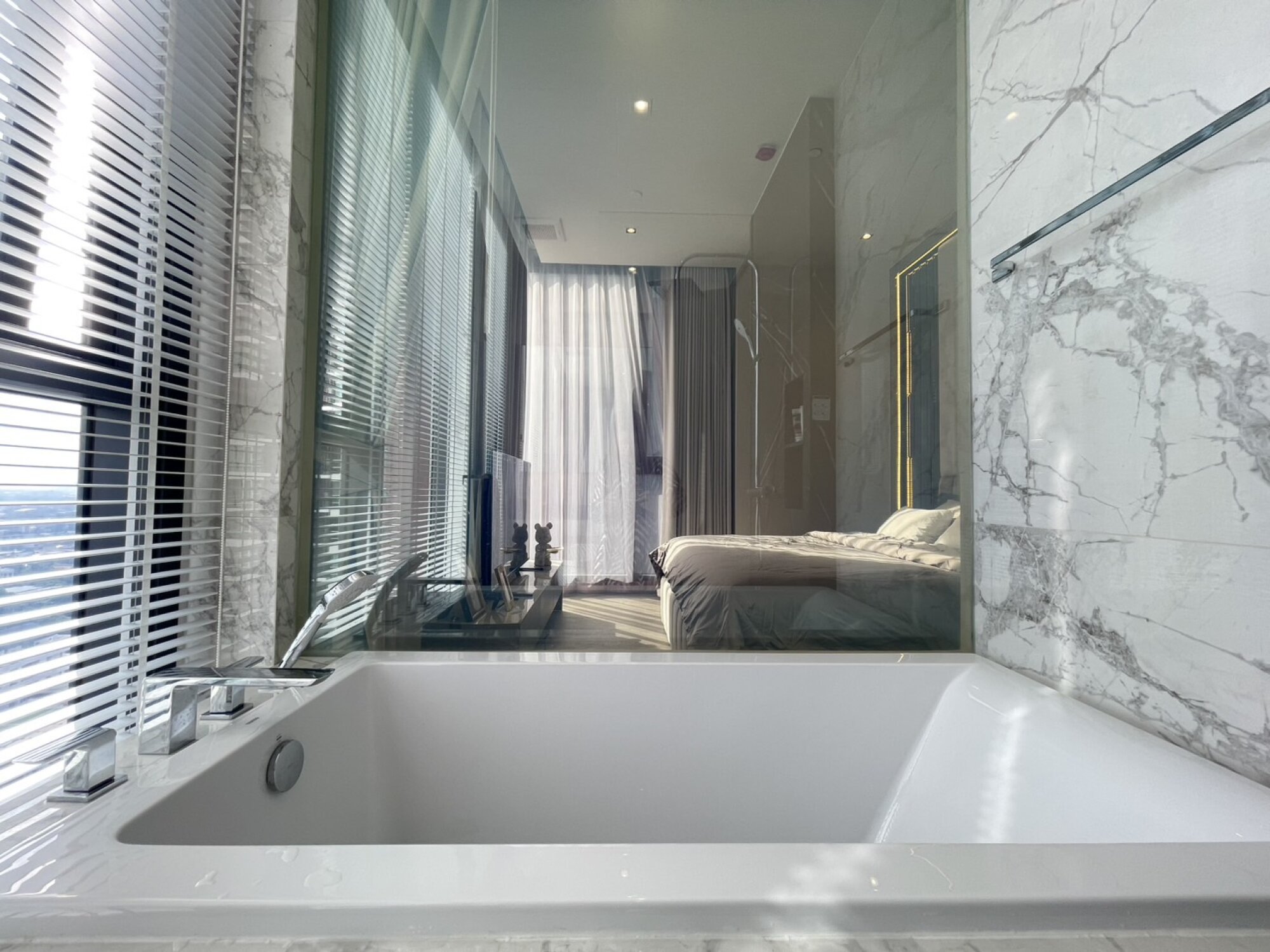 Explore this luxurious 2-bed, 2-bath condo at Hyde Heritage Thonglor. 80 sqm, great amenities, stunning city views, available for rent at 130,000 THB/month.