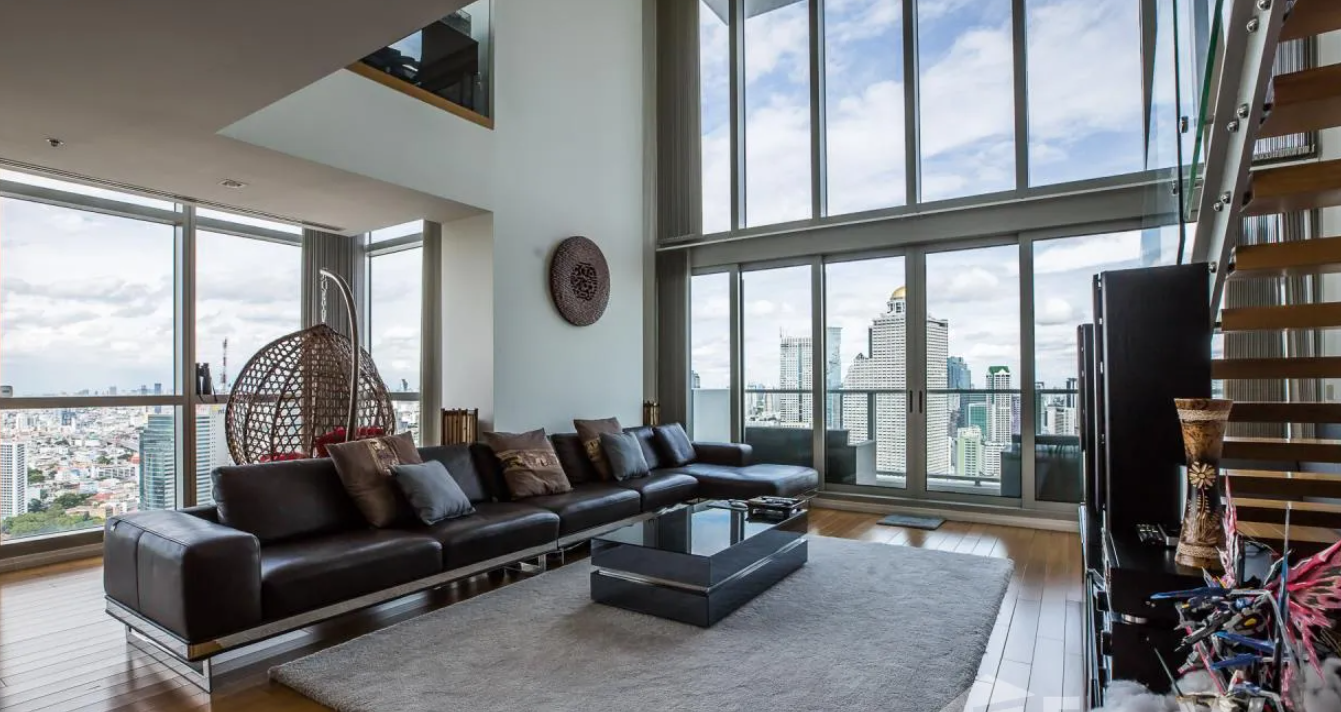Luxurious 4-bed, 3-bath, 258 sqm duplex at The River Bangkok. High-floor unit with stunning river views. For sale at ฿74.5M. Contact us for a viewing!