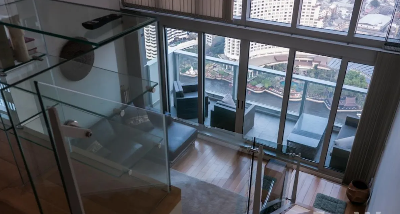 Luxurious 4-bed, 3-bath, 258 sqm duplex at The River Bangkok. High-floor unit with stunning river views. For sale at ฿74.5M. Contact us for a viewing!