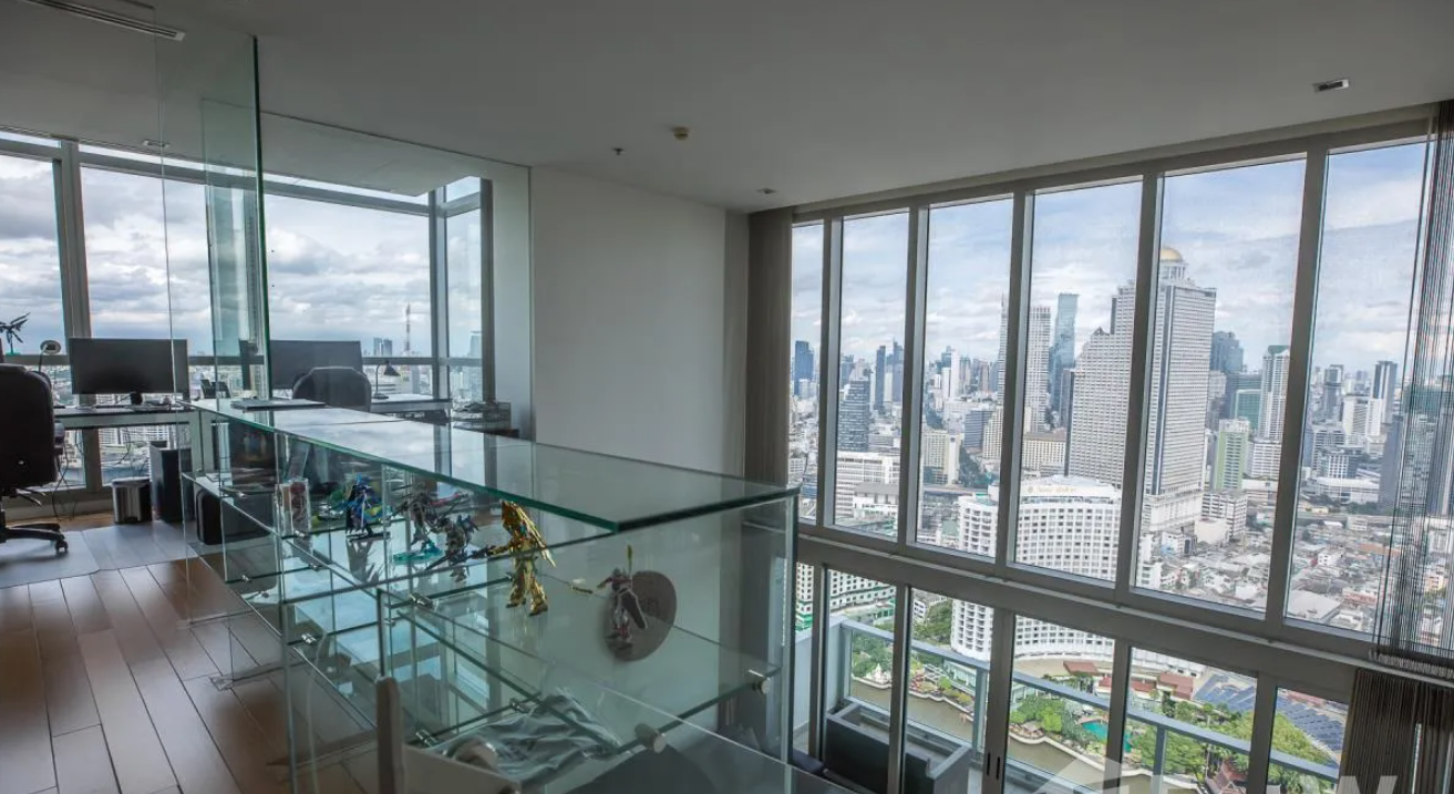Luxurious 4-bed, 3-bath, 258 sqm duplex at The River Bangkok. High-floor unit with stunning river views. For sale at ฿74.5M. Contact us for a viewing!