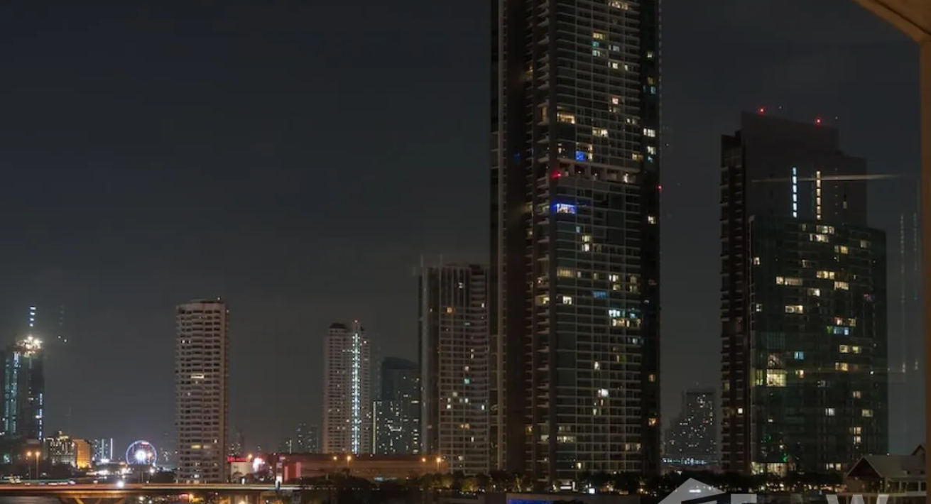 Luxurious 4-bed, 3-bath, 258 sqm duplex at The River Bangkok. High-floor unit with stunning river views. For sale at ฿74.5M. Contact us for a viewing!