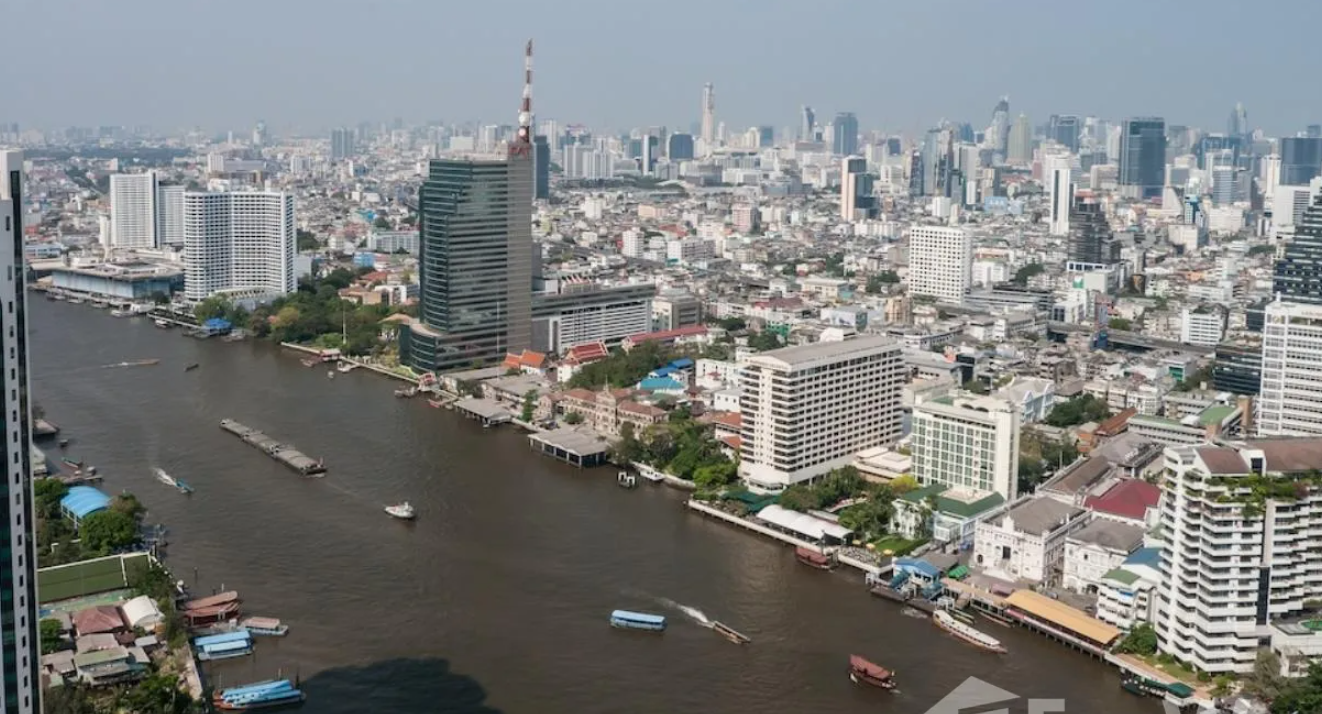 Luxurious 4-bed, 3-bath, 258 sqm duplex at The River Bangkok. High-floor unit with stunning river views. For sale at ฿74.5M. Contact us for a viewing!