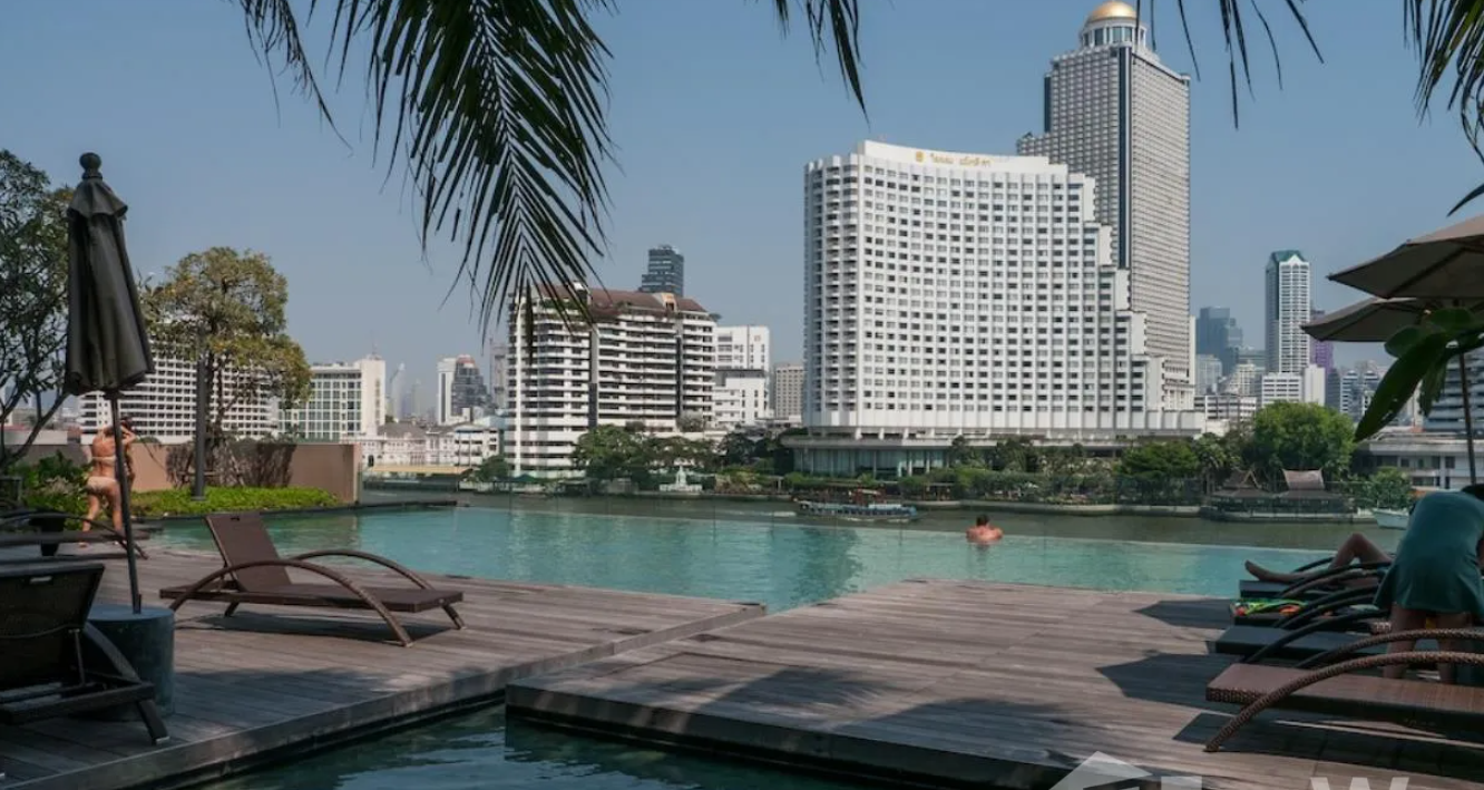 Luxurious 4-bed, 3-bath, 258 sqm duplex at The River Bangkok. High-floor unit with stunning river views. For sale at ฿74.5M. Contact us for a viewing!
