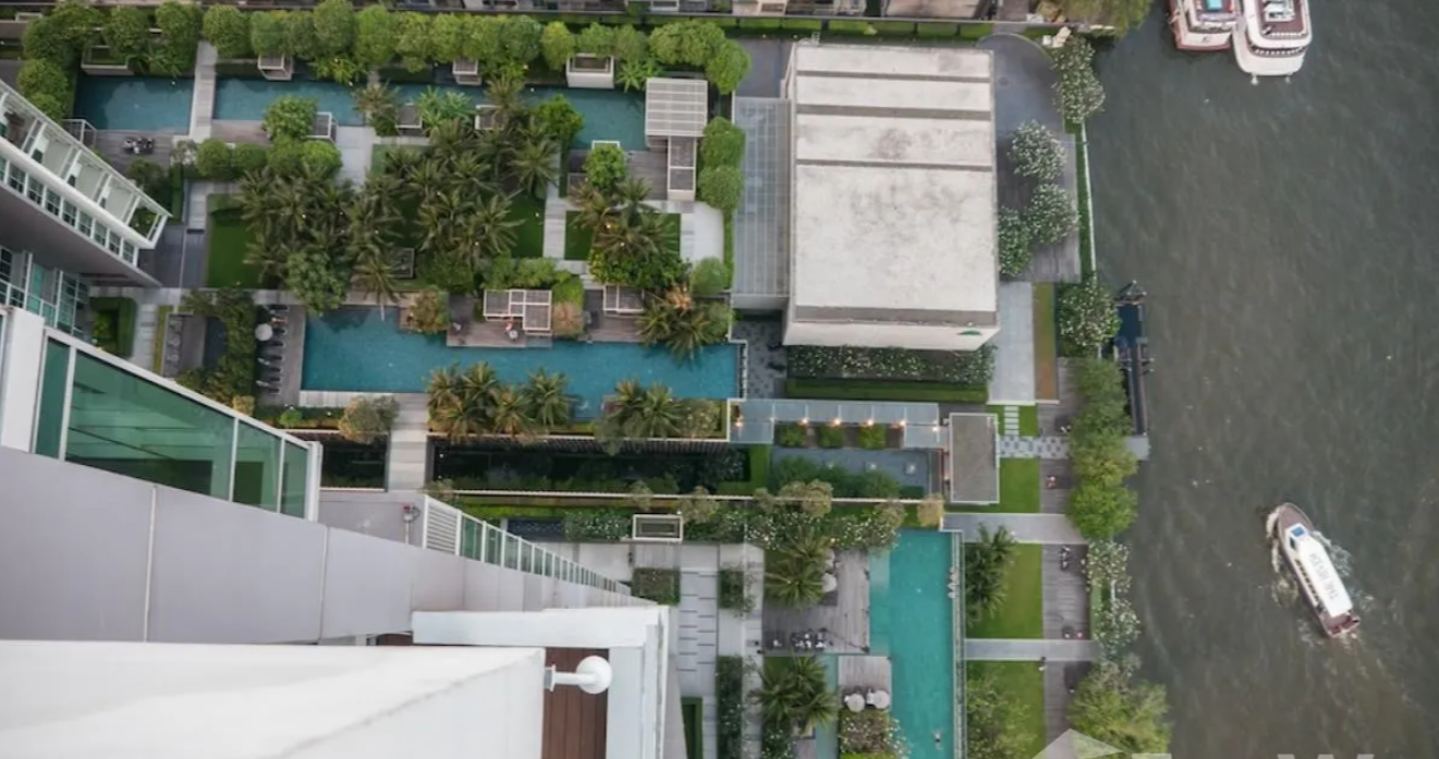 Luxurious 4-bed, 3-bath, 258 sqm duplex at The River Bangkok. High-floor unit with stunning river views. For sale at ฿74.5M. Contact us for a viewing!