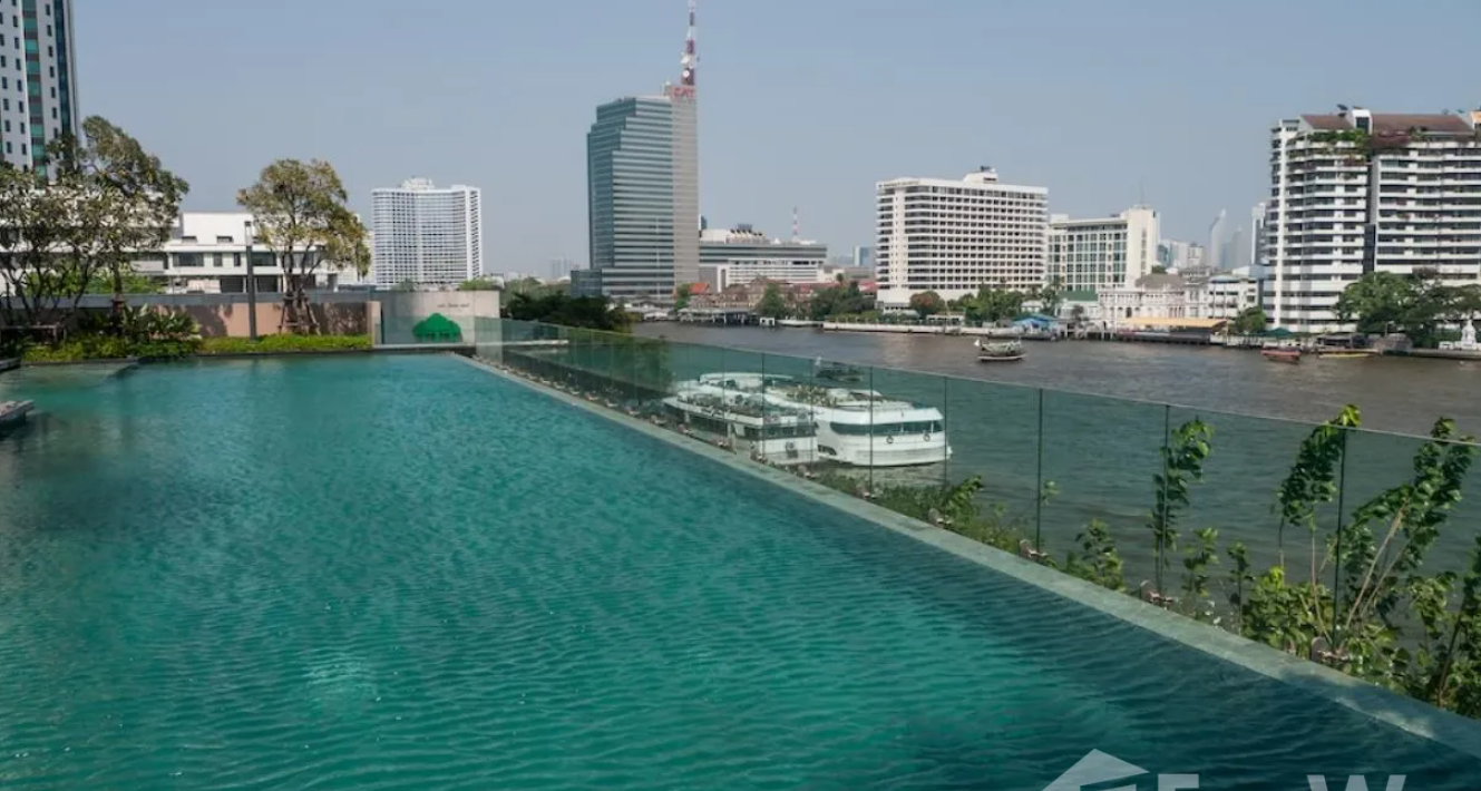 Luxurious 4-bed, 3-bath, 258 sqm duplex at The River Bangkok. High-floor unit with stunning river views. For sale at ฿74.5M. Contact us for a viewing!
