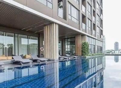 Modern 2-bed, 2-bath, 70 sqm corner unit at The Line Sukhumvit 71. 7 mins to BTS Phra Khanong. Pool, gym, co-working space. Rent ฿40K/month.