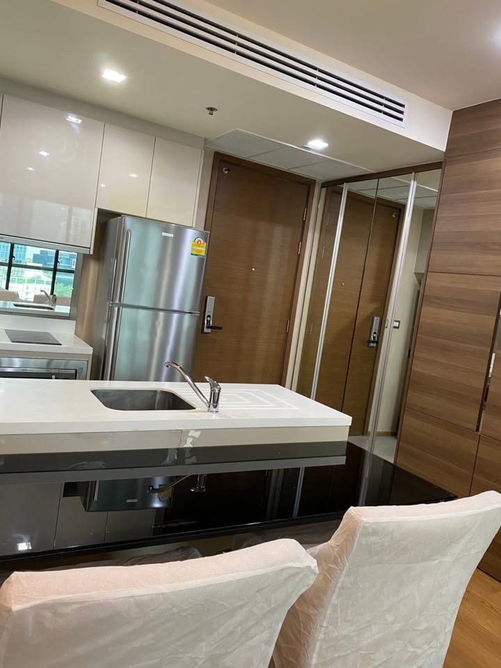 Stylish 1-bed, 1-bath condo at The Address Sathorn, 46.6 sqm, 12th floor with Mahanakhon Kingpower view. Prime location near BTS St. Louis & Chong Nonsi. Rent starts at 29,500 THB/month.