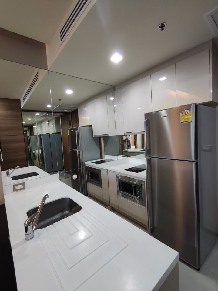 Stylish 1-bed, 1-bath condo at The Address Sathorn, 46.6 sqm, 12th floor with Mahanakhon Kingpower view. Prime location near BTS St. Louis & Chong Nonsi. Rent starts at 29,500 THB/month.