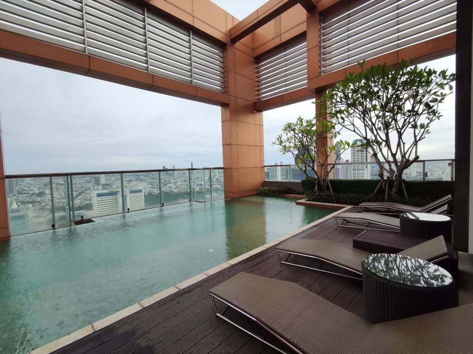 Stylish 1-bed, 1-bath condo at The Address Sathorn, 46.6 sqm, 12th floor with Mahanakhon Kingpower view. Prime location near BTS St. Louis & Chong Nonsi. Rent starts at 29,500 THB/month.