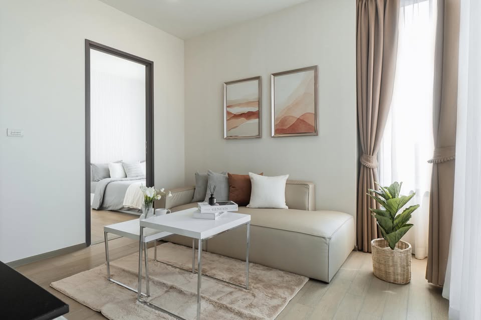 Elegant 2-bedroom condo at Pyne by Sansiri, featuring stylish furnishings, high-floor city views, and premium facilities, located next to BTS Ratchathewi.