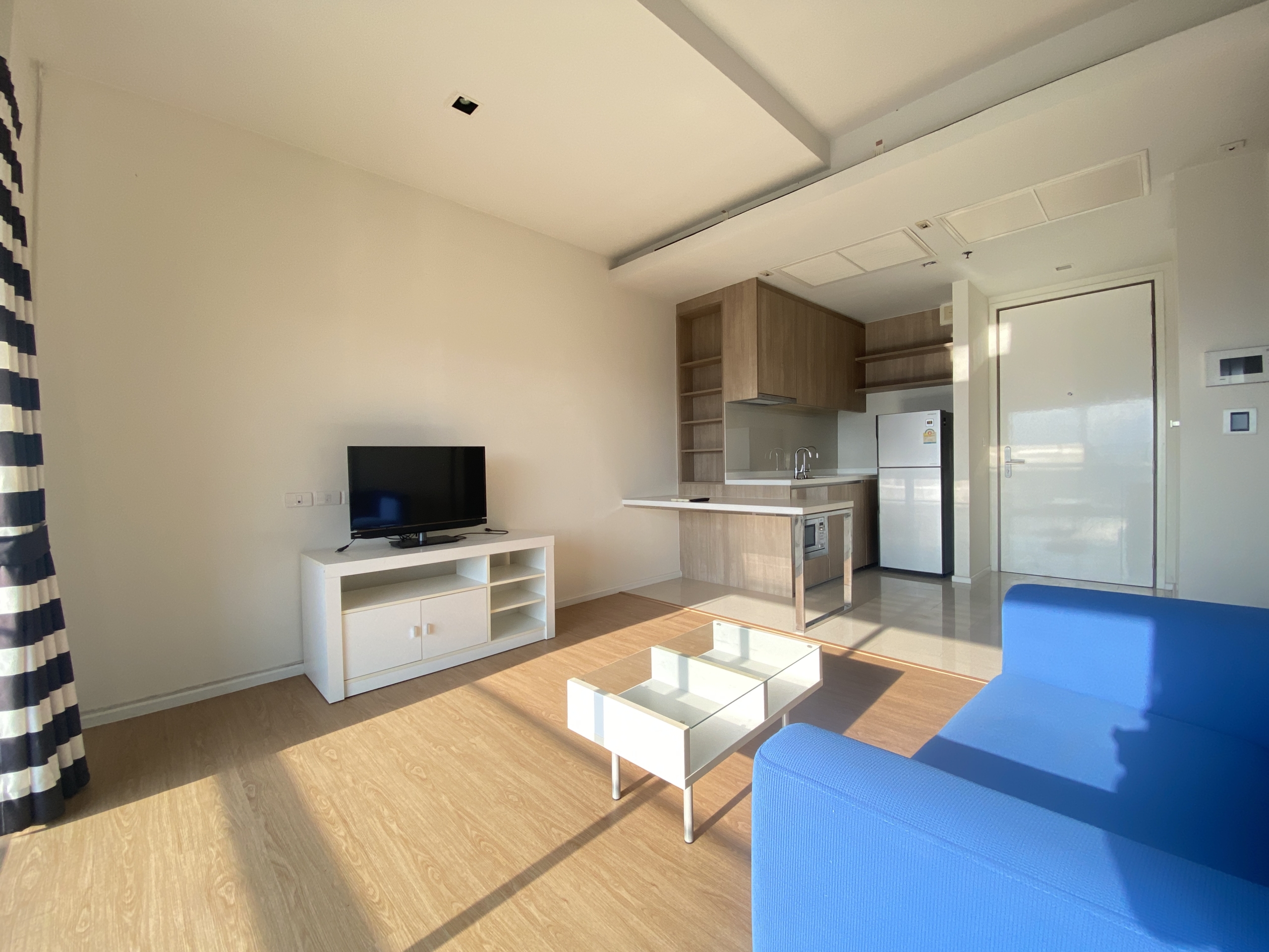 Elegant 1-bedroom condo at Circle Living Prototype with modern furnishings, high-floor city views, and eco-friendly smart home features in Bangkok.