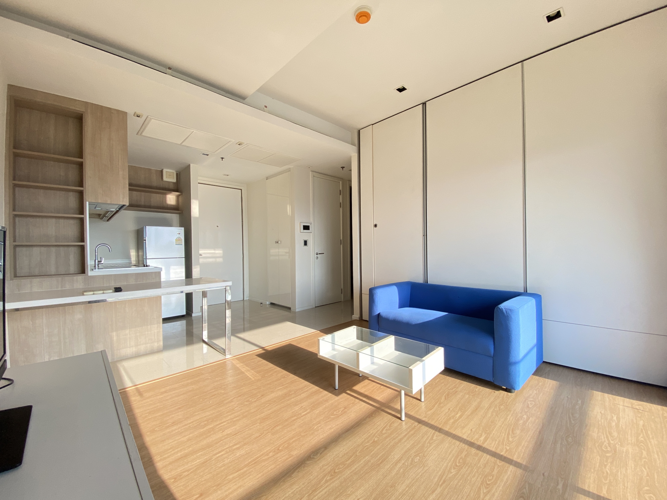 Elegant 1-bedroom condo at Circle Living Prototype with modern furnishings, high-floor city views, and eco-friendly smart home features in Bangkok.