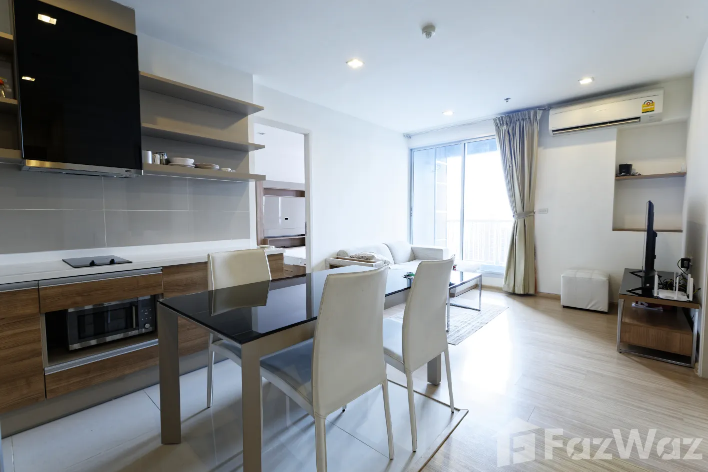 "2 Bedrooms, 2 Bathrooms, 63 sqm at Rhythm Sukhumvit 50. Spacious condo for sale at ฿9,900,000. Perfect for city living near On Nut BTS. Contact us today!"