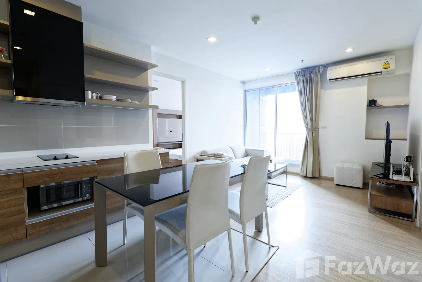 "2 Bedrooms, 2 Bathrooms, 63 sqm at Rhythm Sukhumvit 50. Spacious condo for sale at ฿9,900,000. Perfect for city living near On Nut BTS. Contact us today!"