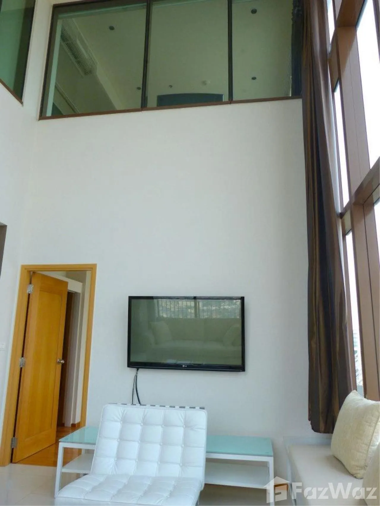 Stunning 2-bed, 2-bath duplex condo in Emporio Place, 134 sqm. For sale at ฿25M. Luxury living in Sukhumvit with excellent amenities and top-floor views.