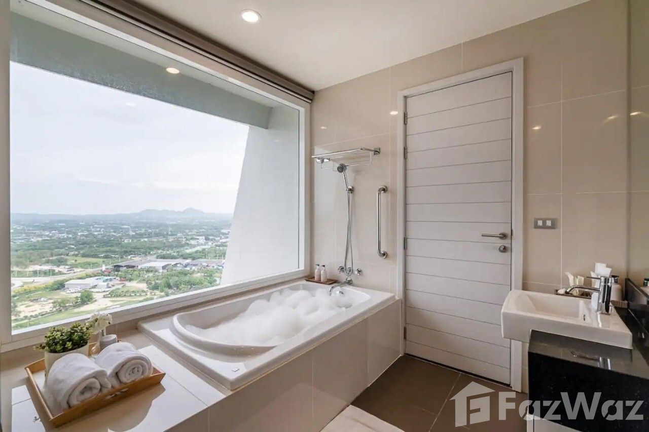 Luxury 1-bed, 1-bath, 59 sqm condo at Mövenpick Siam Na Jomtien, Pattaya. Stunning marina views, beachfront, and top amenities. For Sale: ฿8.5M.