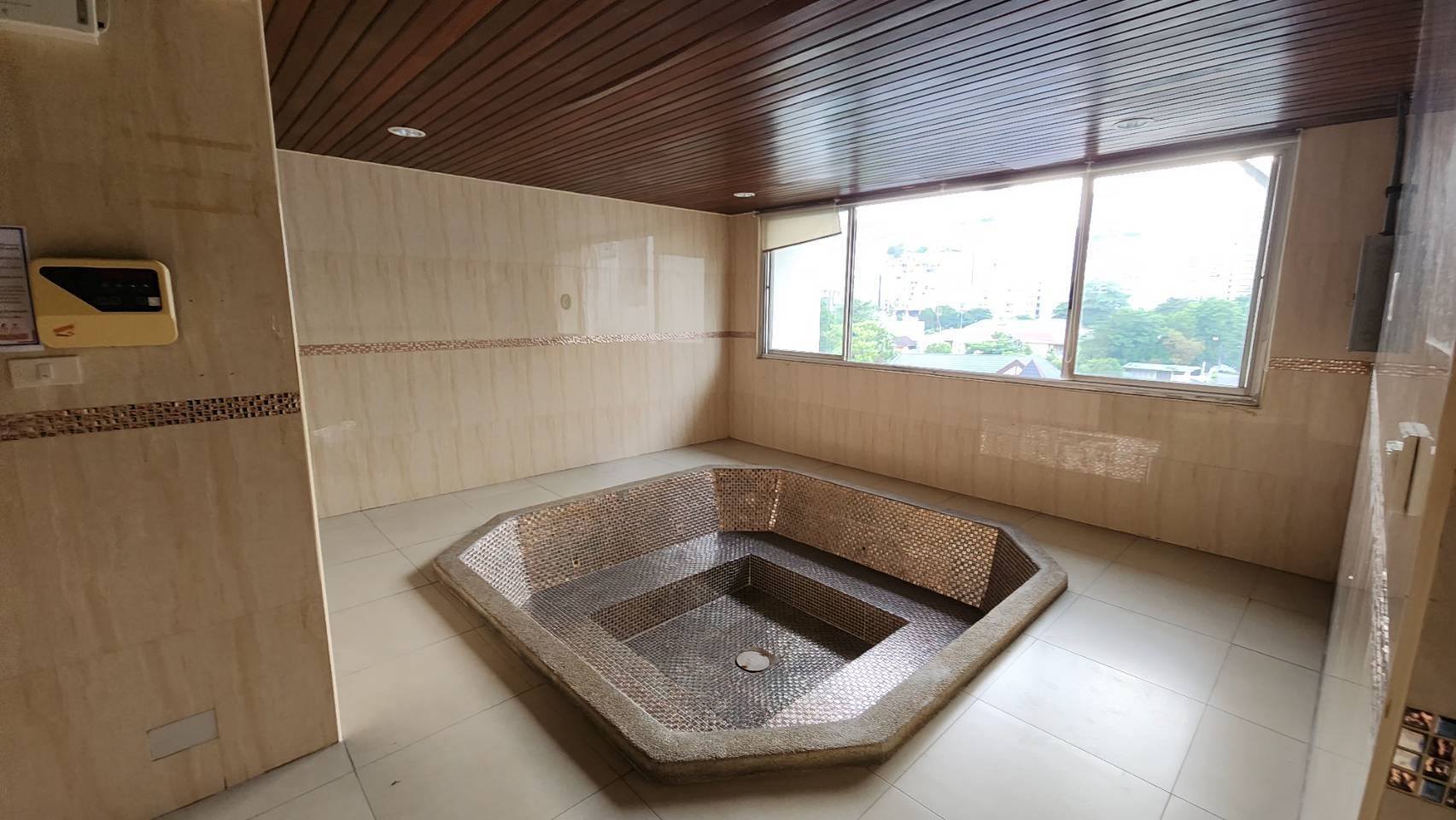 Elegant 3-bedroom condo at DS Tower 2 Sukhumvit 39 with spacious interiors, modern furnishings, and a high-floor city view, offering a luxury urban living experience.