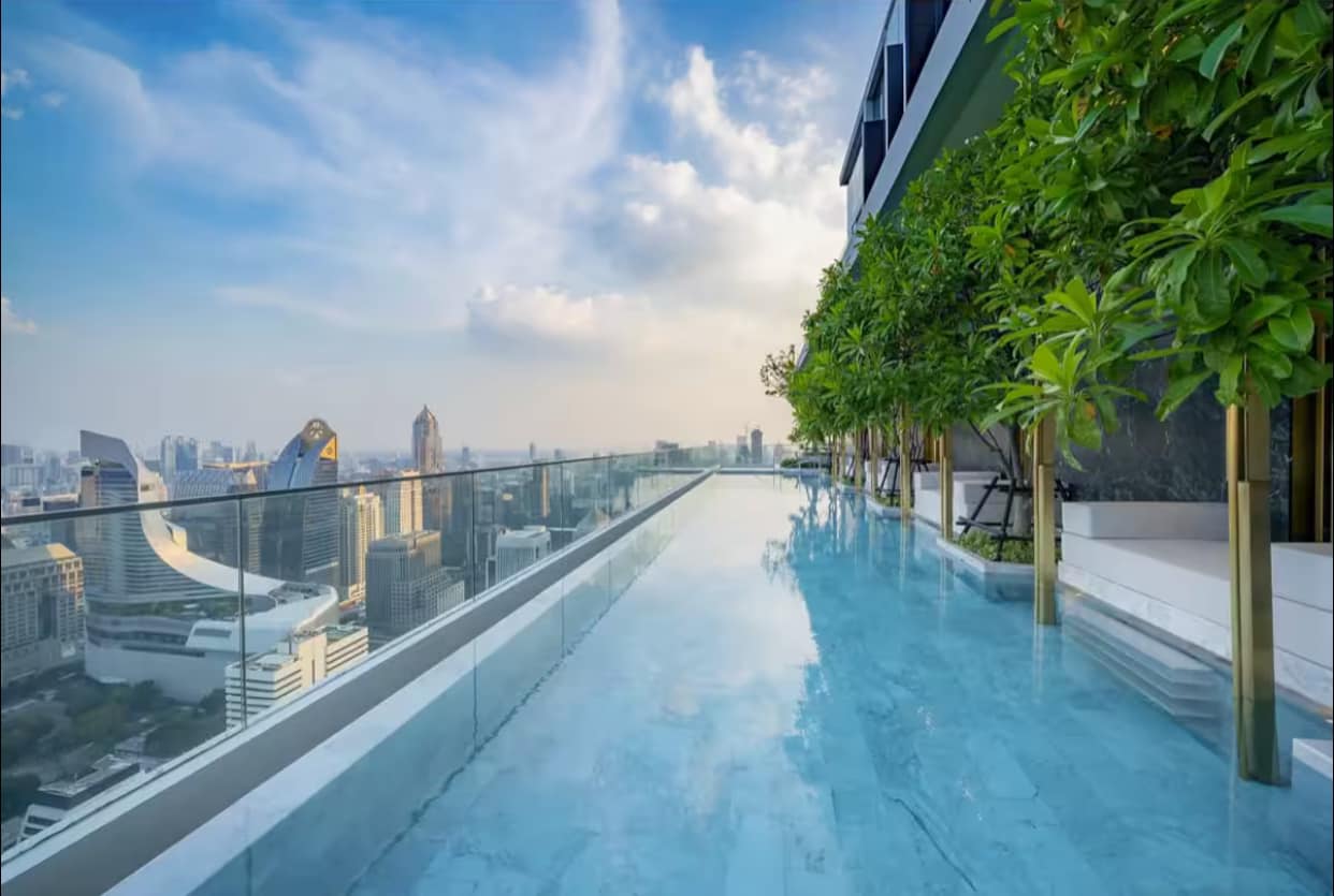 Luxury 1-bed condo for rent at 28 Chidlom (45 sqm). Prime location near Central World. Infinity pool, gym, sauna. Rent from 68,000 THB/month.